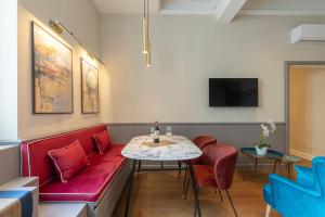 Телевизор и/или развлекательный центр в Design Florence Suite in Florence