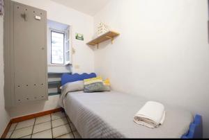 A bed or beds in a room at Villa GREG stupenda location sulla spiaggia con accesso diretto al mare