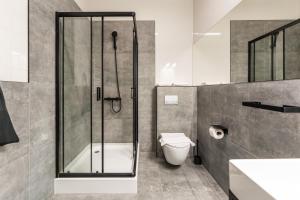 Ένα μπάνιο στο IND.U Apartamenty +67 φωτογραφίες