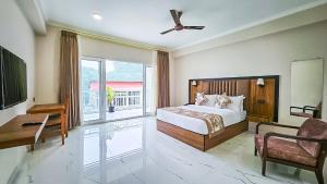 Voodi või voodid majutusasutuse Yashshree Resorts & Spa Kalimpong toas