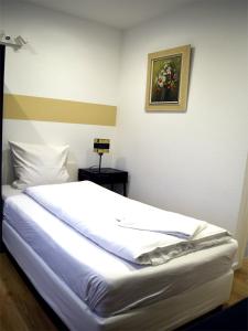 Voodi või voodid majutusasutuse Hotel Restaurant Krebs toas
