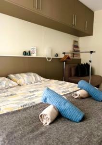 Postel nebo postele na pokoji v ubytování Green Oasis Apartment - Orlandito
