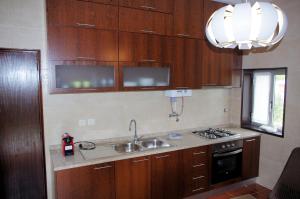 Dapur atau dapur kecil di Casa dos Tios