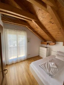 Ένα ή περισσότερα κρεβάτια σε δωμάτιο στο FaWa Apartments "Penthouse - Villa Toni"