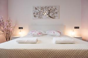 Letto o letti in una camera di Villa Sun Kiss
