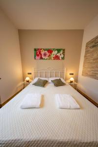 Letto o letti in una camera di Villa Sun Kiss