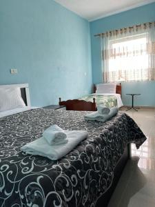 Postel nebo postele na pokoji v ubytování Hotel Restaurant Aleksander