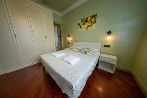 Letto o letti in una camera di Villa Sun Kiss
