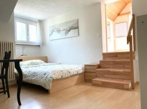 Postel nebo postele na pokoji v ubytování Zimmer am See
