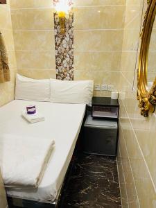 Letto o letti in una camera di Maharaja Guest House Block C