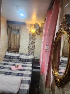 Letto o letti in una camera di Maharaja Guest House Block C