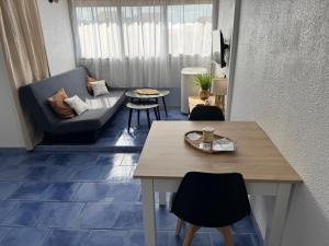 Coin salon dans l'établissement Appartement 4 personnes à 50 m de la plage