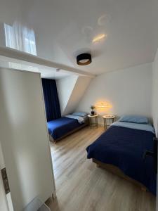 Postel nebo postele na pokoji v ubytování Gasthaus L&A Kunz