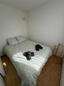 Un ou plusieurs lits dans un hébergement de l'établissement Appartement 4 personnes à 50 m de la plage