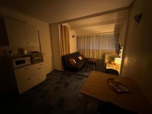 Cuisine ou kitchenette dans l'établissement Appartement 4 personnes à 50 m de la plage