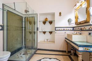 a bathroom with a shower and a sink and a toilet at Palazzo Gallo Resort in Gallipoli +131 photos