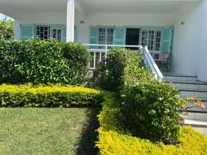 Vrt pred nastanitvijo Beachfront Appartment