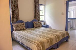 Postel nebo postele na pokoji v ubytování Beachfront Appartment