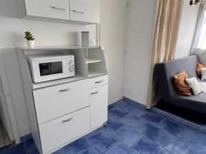 Cuisine ou kitchenette dans l'établissement Appartement 4 personnes à 50 m de la plage