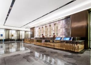 Vstupní hala nebo recepce v ubytování 西安高新锦业路桔子水晶酒店