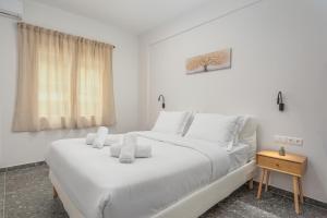 Postel nebo postele na pokoji v ubytování Modern & Elegant Getaway near Pasalimani