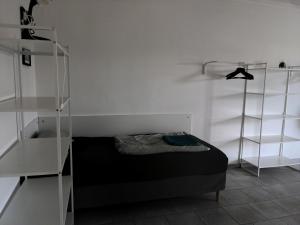 Ένα ή περισσότερα κρεβάτια σε δωμάτιο στο Schöne Monteurwohnung Ferienwohnung Langenfeld