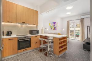 Kuchyň nebo kuchyňský kout v ubytování Modern & Elegant Getaway near Pasalimani