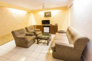 TV a/nebo společenská místnost v ubytování Hotel O Hotel Landmark Inn