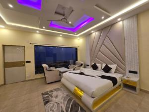 Voodi või voodid majutusasutuse Ricardo Beach Resort toas