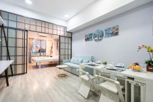 Posezení v ubytování Double E SaiGon Apartment in Rivergate Building