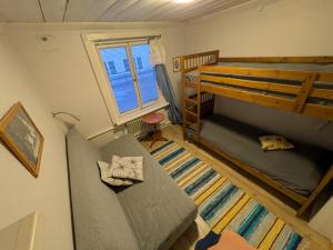 Postel nebo postele na pokoji v ubytování Hostel Räntmästaregården