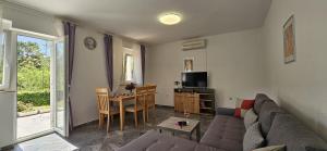 Posezení v ubytování Apartment Nika
