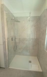 a shower with a glass door in a bathroom at Anima di Mare in Portovenere +37 photos