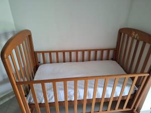 Postel nebo postele na pokoji v ubytování Kandy Grand Hill