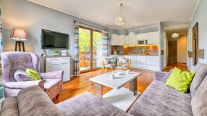 Posedenie v ubytovaní Apartamenty Sun & Snow Bawaria II