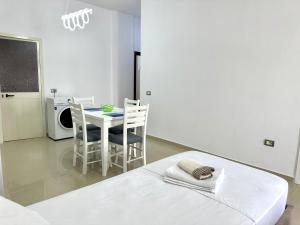 Postel nebo postele na pokoji v ubytování Shell Home golem 1