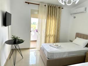 Postel nebo postele na pokoji v ubytování Shell Home golem 1