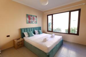 Ένα ή περισσότερα κρεβάτια σε δωμάτιο στο Private Villa With Garden And Comfort - Close To City Center