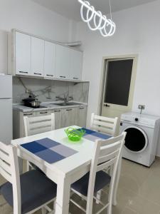 Kuchyň nebo kuchyňský kout v ubytování Shell Home golem 1