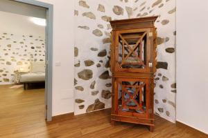 A bed or beds in a room at Casa Milagrito Betancuria