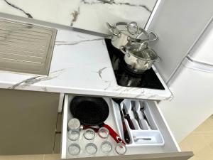 Kuchyň nebo kuchyňský kout v ubytování Shell Home golem 1