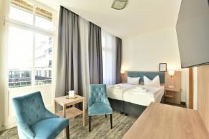 Postel nebo postele na pokoji v ubytování Hotel Meereseck