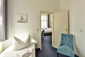 Postel nebo postele na pokoji v ubytování Hotel Meereseck