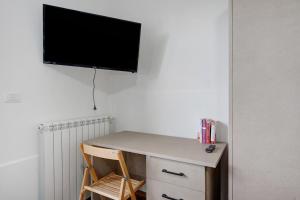 TV a/nebo společenská místnost v ubytování Casa Vacanza Da Licia