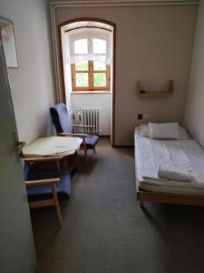 Voodi või voodid majutusasutuse PENZION "U MLÝNA" Mlýnská 678 toas