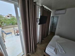 Afbeelding uit fotogalerij van Vila Rafael Ksamil in Ksamil