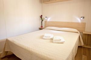Postel nebo postele na pokoji v ubytování La Siesta Salou Resort & Camping