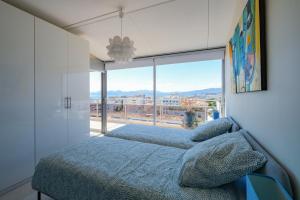 Posteľ alebo postele v izbe v ubytovaní Villa sur le toit - Vue mer exceptionnelle