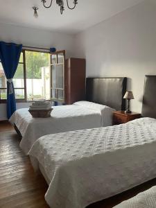 Postel nebo postele na pokoji v ubytování El Colonial + 14 fotografií