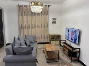 Et tv og/eller underholdning på DC Apartment Near USA Embassy